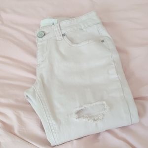 Light pink distressed jeggings
